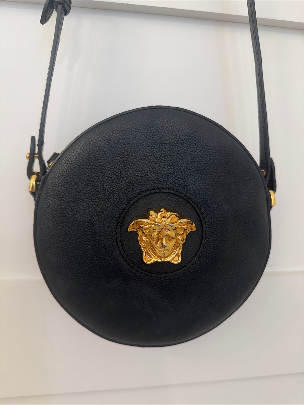 Versace Black Round Leather Crossbody with Gold Medusa Plaque